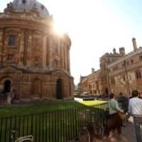 OXFORD, ENGLAND - OCTOBER 08:  Students walk through Oxford city centre as Oxford University commences its academic year on October 8, 2009 in Oxford, England. Oxford University has a student population in excess of 20,000 taken from over 140 countries around the world. The University is made up of 38 independent, self-governing colleges, three of which: University College, Balliol College, and Merton College, were established by the 13th century. According to the QS/Times Higher Education rankings, Oxford has slipped down the international league table from fourth to a joint fifth place with Imperial College London.  (Photo by Oli Scarff/Getty Images)